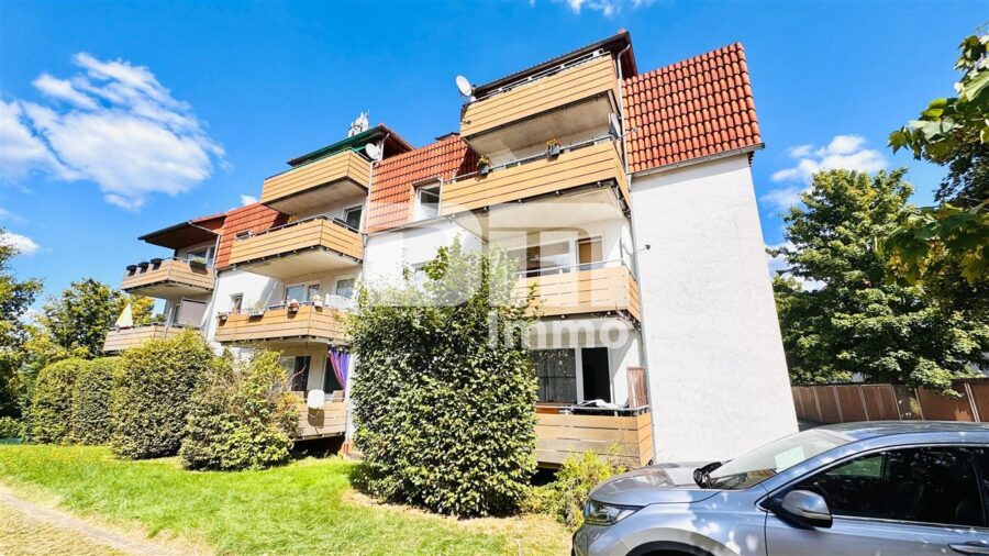 (R)eserviert!WE3 - Moderne Dreizimmerwohnung BJ 1991 mit sonnigem Balkon in zentraler Lage - Titel Rückansicht